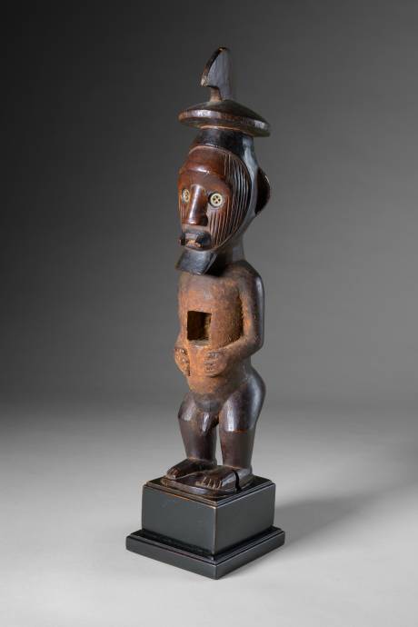 Teke, dark red patina, mother-of-pearl eyes
